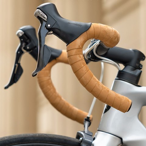Owijka na kierownicę rowerową silikonowa perforowana - pomarańczowa Owijka na kierownicę rowerową silikonowa perforowana - pomarańczowa